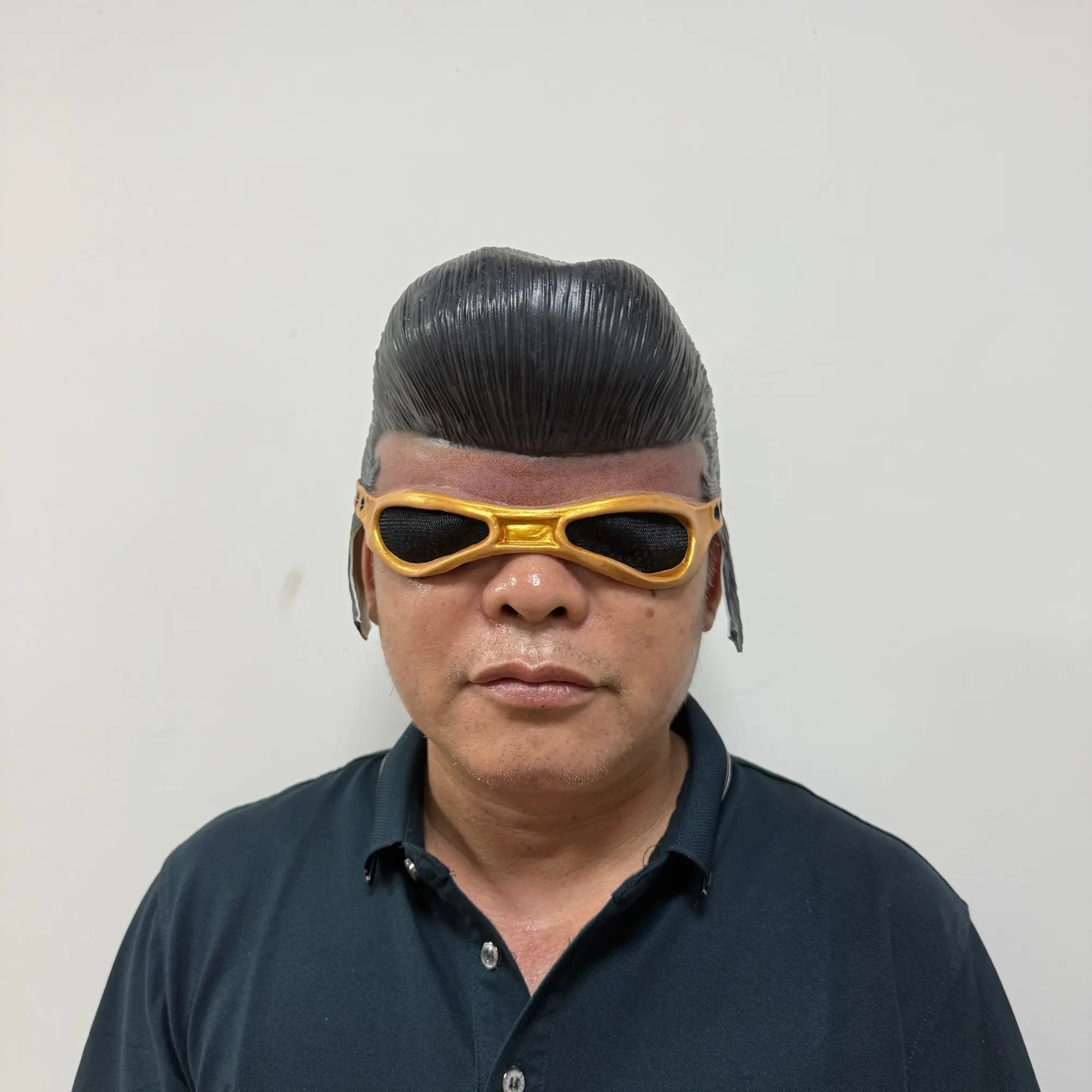 Adult wearing retro rockstar pompadour mask front view