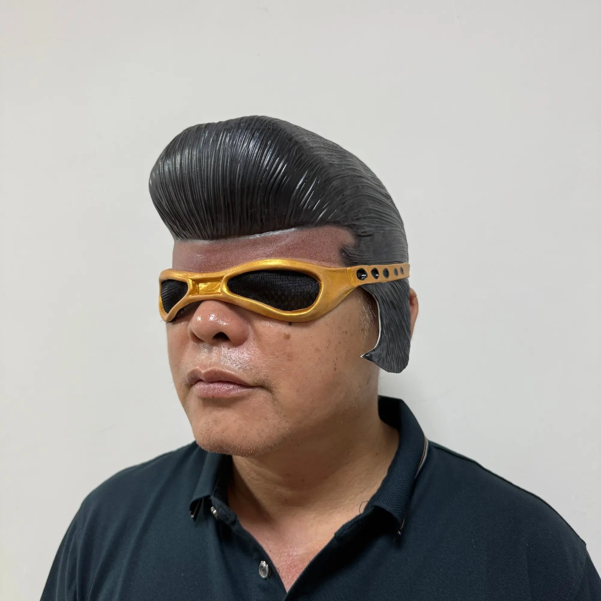 Adult wearing retro rockstar pompadour mask in real-world fit photo